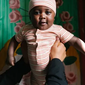 Riffle Amsterdam - Organic Short Sleeve Romper - Tangerine Stripe