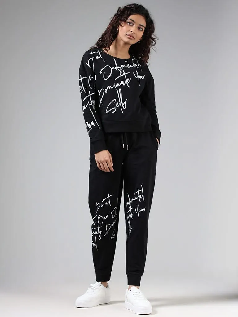 Studiofit Black Typographic Printed Cotton Joggers